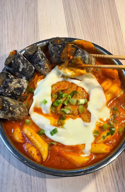Easy Crispy Rice Paper Gimmari filled with seasoned sweet potato glass noodles, pan-fried until golden brown and crispy, served on a plate with dipping sauce.